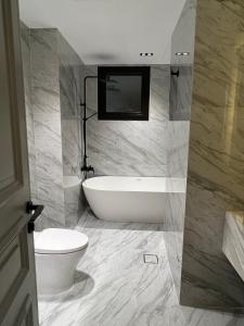 Vannituba majutusasutuses The Key - Luxury Apartment