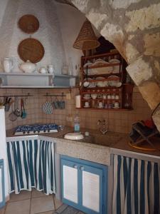 Kuchyň nebo kuchyňský kout v ubytování Casa del Pescatore