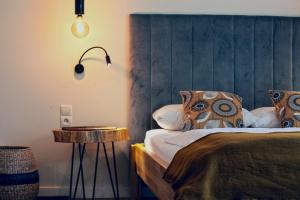 Posteľ alebo postele v izbe v ubytovaní Hotel Na Skarpie - Charzykowy