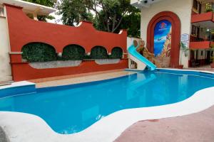 A piscina localizada em Hotel Hacienda María Eugenia Acapulco ou nos arredores