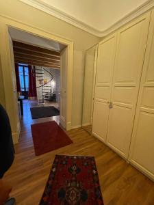 A bed or beds in a room at Katanehouse Charme