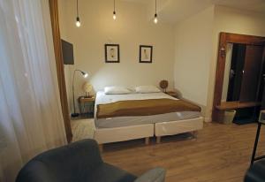 Posteľ alebo postele v izbe v ubytovaní Hotel Na Skarpie - Charzykowy