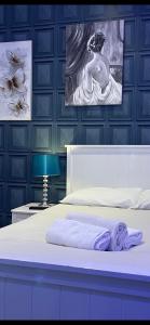 Postel nebo postele na pokoji v ubytování Maria