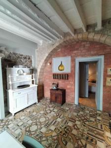 Kuchyň nebo kuchyňský kout v ubytování Casa dei cactus