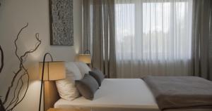Posteľ alebo postele v izbe v ubytovaní Hotel Na Skarpie - Charzykowy