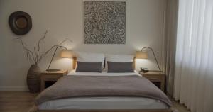 Posteľ alebo postele v izbe v ubytovaní Hotel Na Skarpie - Charzykowy