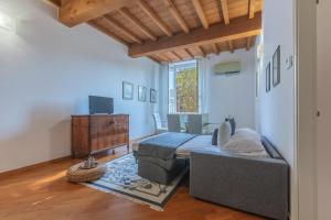 Posteľ alebo postele v izbe v ubytovaní Palazzo Manfredini Exclusive & Deluxe Apartment