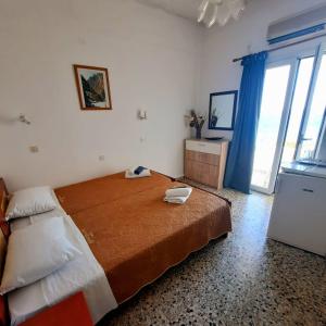 Postel nebo postele na pokoji v ubytování Paradise
