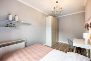 Posteľ alebo postele v izbe v ubytovaní Prestige Verdant Apartment