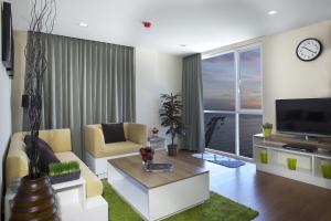 Khu vực ghế ngồi tại BBG Seaside Luxurious Service Apartment