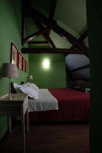 Postel nebo postele na pokoji v ubytování Hotel Villa Dorata