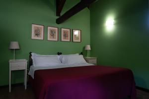 Postel nebo postele na pokoji v ubytování Hotel Villa Dorata