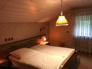 Postel nebo postele na pokoji v ubytování Gemütliches Gästehaus!