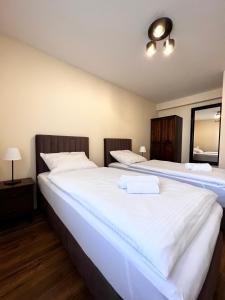Ένα ή περισσότερα κρεβάτια σε δωμάτιο στο Apartments Wile Süd