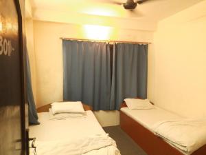 เตียงในห้องที่ Hotel Aerial View