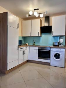 Kuchyň nebo kuchyňský kout v ubytování Apartments Wile Süd
