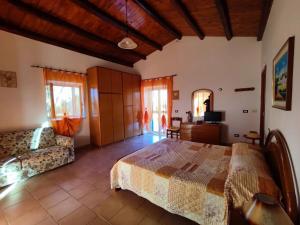 Postel nebo postele na pokoji v ubytování Il Casale di Bovo Marina