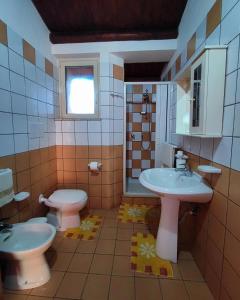 Koupelna v ubytování Il Casale di Bovo Marina + 74 fotografií