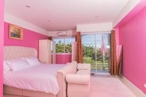 Postel nebo postele na pokoji v ubytování PK Villa Koh Samui