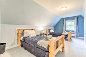 a bedroom with a bed and a couch at Grand Worcester Getaway with Large Private Yard! in Worcester