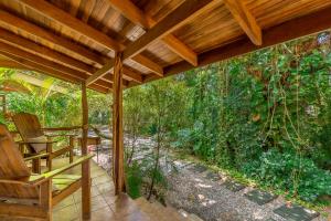 Zahrada ubytování Makanas Beach Bungalows + 33 fotografií