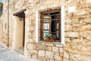 Fotografie z fotogalerie ubytování Sa dommu de su maistru 'e linna _SA SCANCìA_ v destinaci Baunei