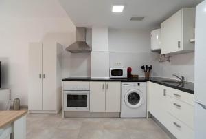 Kuchyň nebo kuchyňský kout v ubytování Magnifico apartamento cerca del centro con A.A. - CID 2