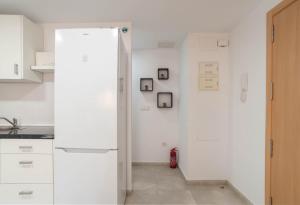 Kuchyň nebo kuchyňský kout v ubytování Magnifico apartamento cerca del centro con A.A. - CID 2