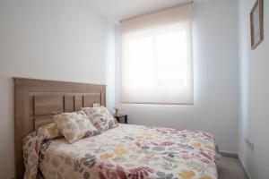 Postel nebo postele na pokoji v ubytování Magnifico apartamento cerca del centro con A.A. - CID 2