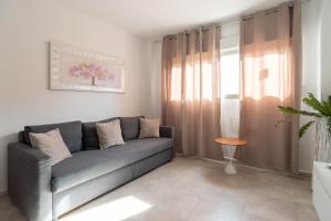 Posezení v ubytování Magnifico apartamento cerca del centro con A.A. - CID 2