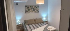 En eller flere senge i et værelse på Ensueño