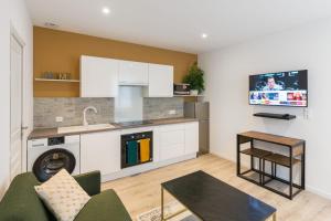 Η κουζίνα ή μικρή κουζίνα στο Désirée Logement Cosy et Charmant 1 er étage