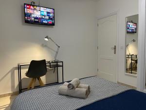 Posteľ alebo postele v izbe v ubytovaní MC Apartments