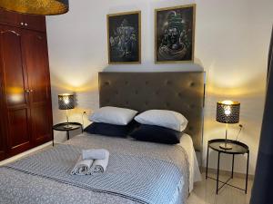 Posteľ alebo postele v izbe v ubytovaní MC Apartments