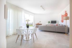 TV a/nebo společenská místnost v ubytování Bungalow en San Agustín "La Cigale"