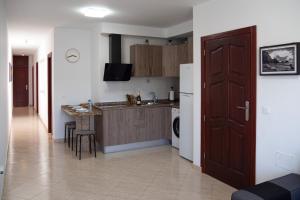 Kuchyňa alebo kuchynka v ubytovaní MC Apartments