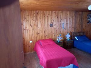 Tempat tidur dalam kamar di Frente al Mar entre Poetas