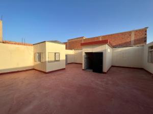 an empty parking lot in an old building at maison familiale calme hostcom in Oujda