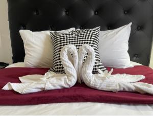 Posteľ alebo postele v izbe v ubytovaní MC Apartments