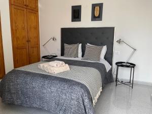 Posteľ alebo postele v izbe v ubytovaní MC Apartments