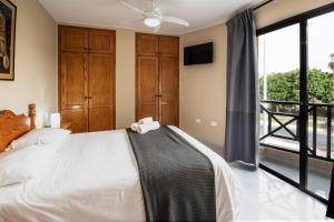 Posteľ alebo postele v izbe v ubytovaní MC Apartments