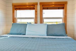 Voodi või voodid majutusasutuse Aloha Tiny Home toas