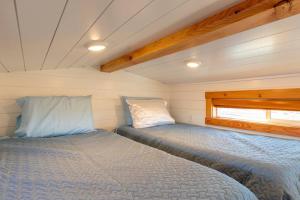 Voodi või voodid majutusasutuse Aloha Tiny Home toas