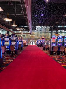 a red carpet in a casino with slot machines at Hollywood Casino Tunica in Robinsonville