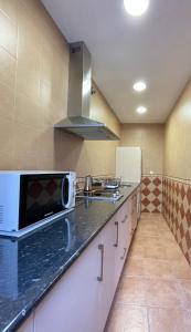 Kuchyňa alebo kuchynka v ubytovaní LaFrenchTouch - Escapada rural en una coqueta casa