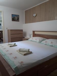 Postel nebo postele na pokoji v ubytování Apartman MAJA