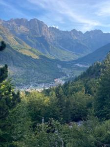 a view of a valley in the mountains at Bujtina Arturi in Valbonë