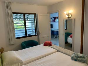 a bedroom with a bed and a window at Casa di Luca EL VERGEL by luca properties gran canaria in Puerto Rico de Gran Canaria +31 photos