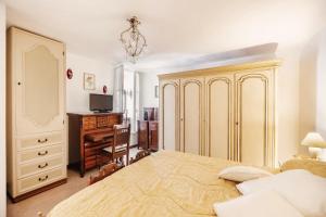 Tempat tidur dalam kamar di Dimora Bellavista,garage privato,due piani