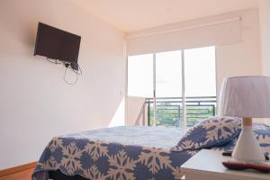 Televisyen dan/atau pusat hiburan di Nuevo, cómodo y acogedor apartamento en Villavicencio.